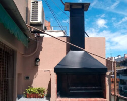 Campana piramidal para parrilla